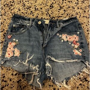 garage jean shorts with flower detailing
